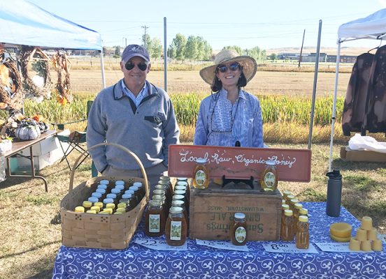 Peter and Barbara Jenny at their honey booth at the market